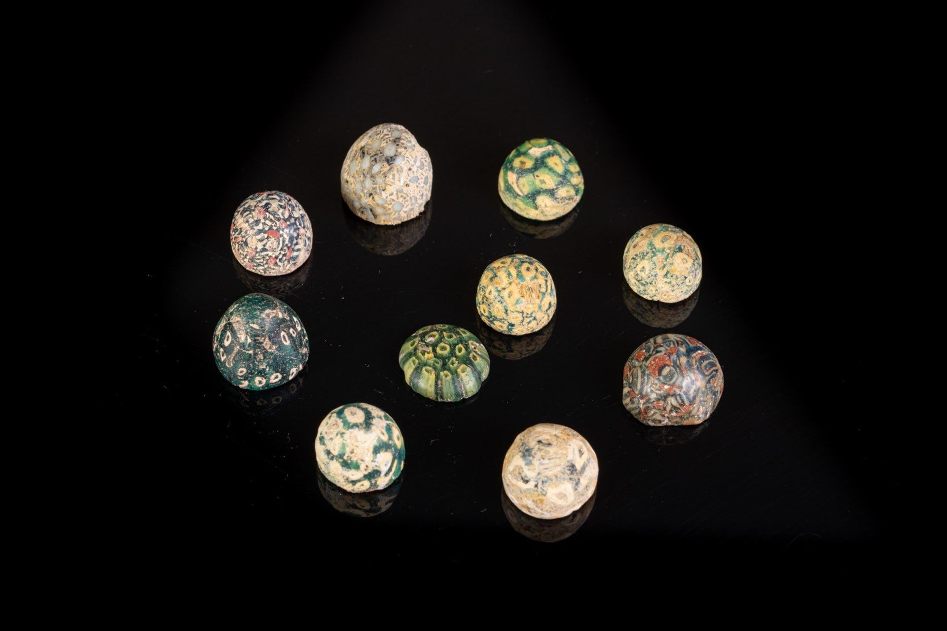 Arte Islamica Ten Abbassid mosaic glass (millefiori) games pieces Mesopotamia, 9th century .
