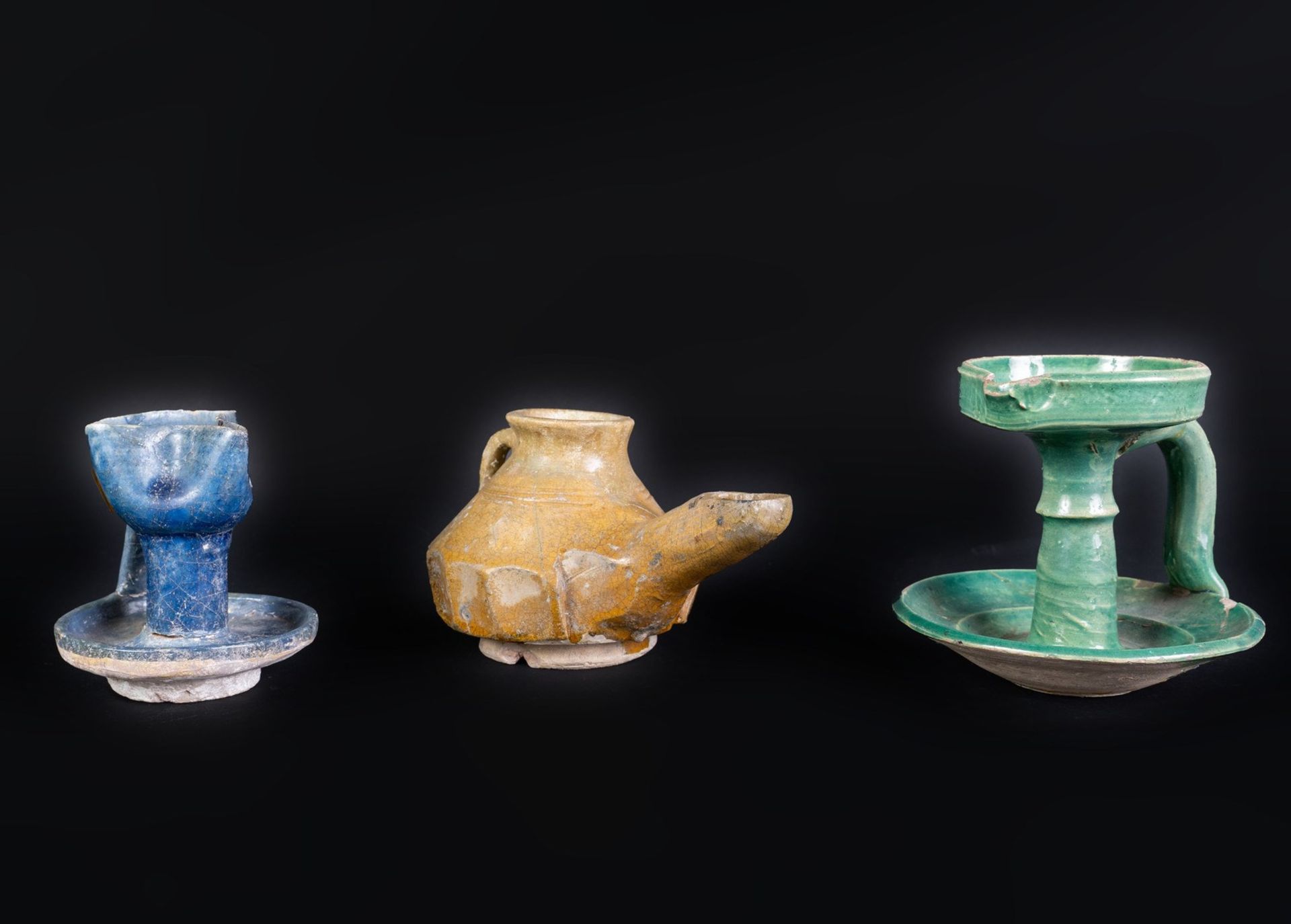 Arte Islamica Three glazed pottery lamps Iran and Levant, 12th - 13th century .