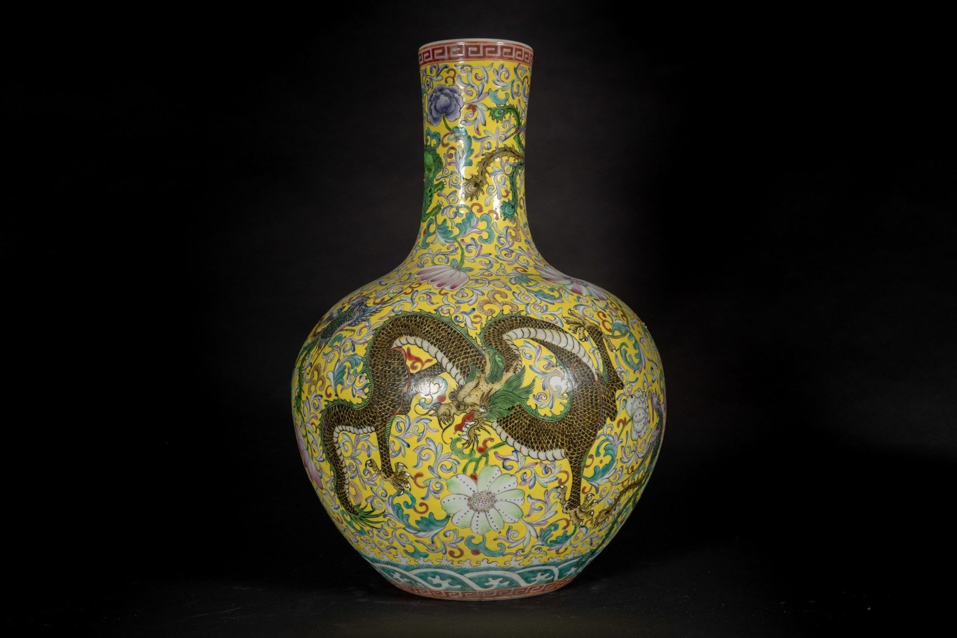 Arte Cinese A large globular porcelain tiaqiuping vase over yellow groundChina, 20th century.