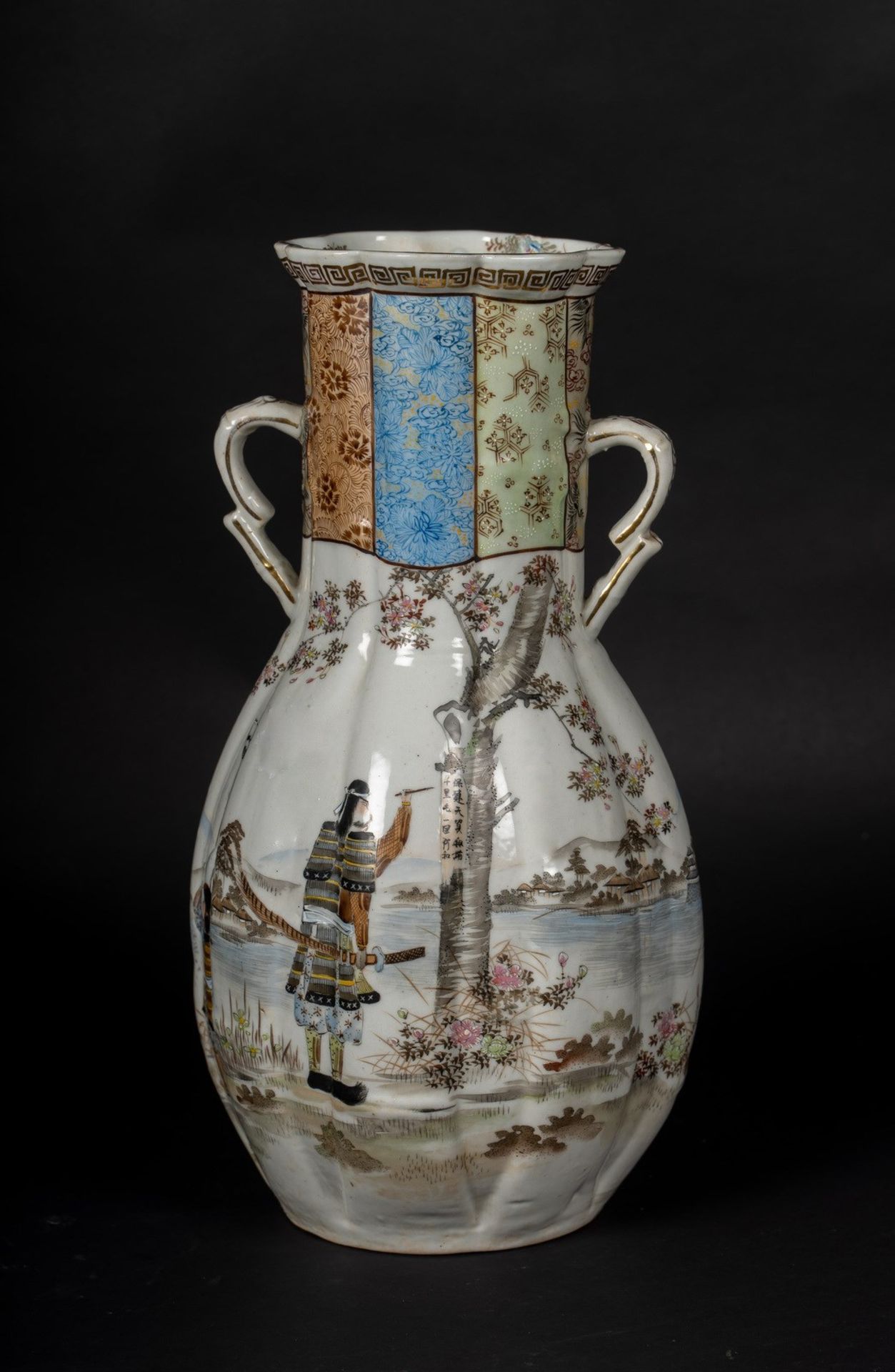 ARTE GIAPPONESE A lobed shaped pottery vase enamelled with a samurai writing a tanzaku Japan, 19th