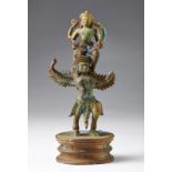 Arte Sud-Est Asiatico A bronze figure of Vishnu and Garuda Cambodia, Khmer, 10th century .