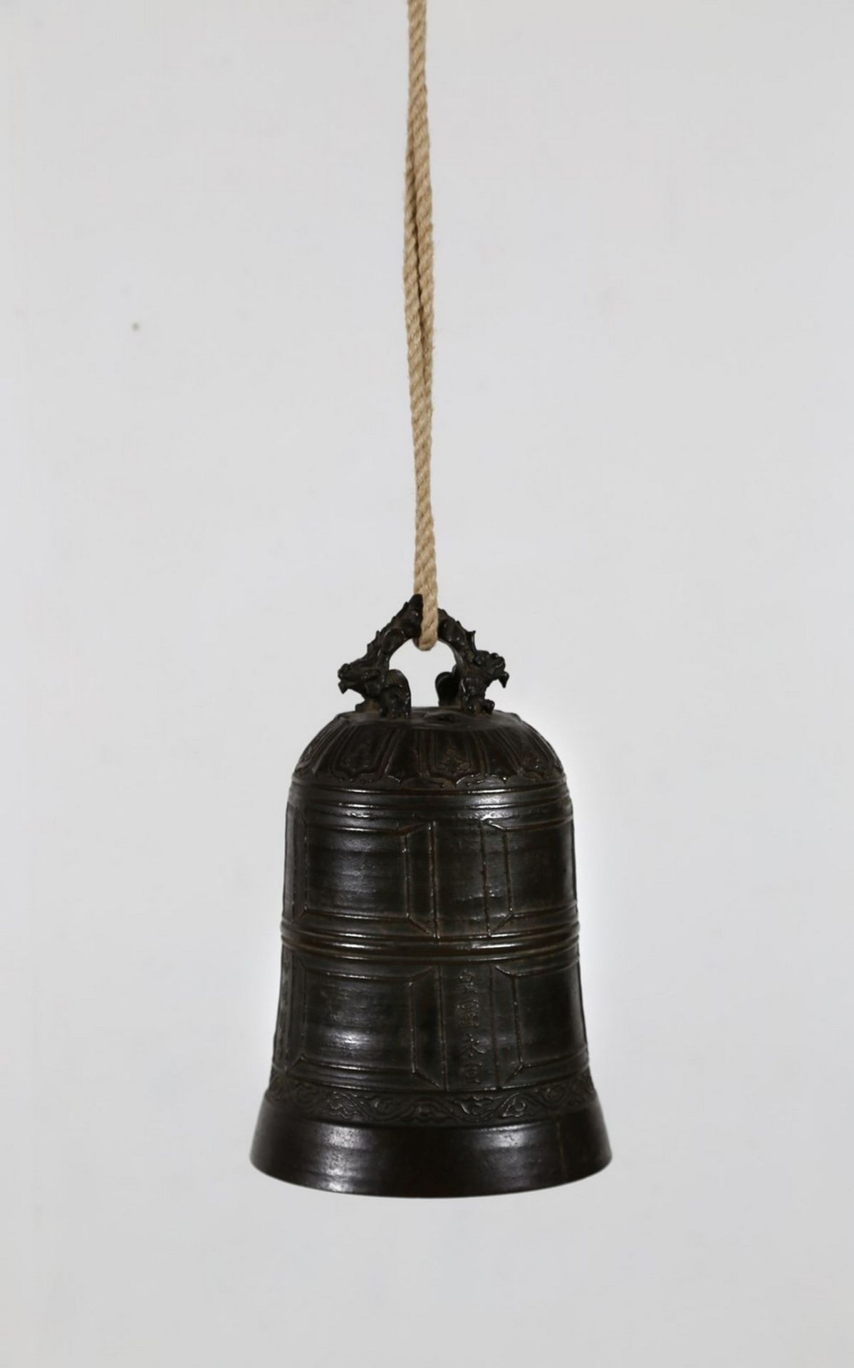 Arte Cinese A bronze temple bell incised with a long dedicatory inscription reading the date and th