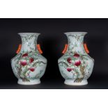 Arte Cinese Pair of monumental thouhu vases decorated with peaches and flowers China, early 20th ce