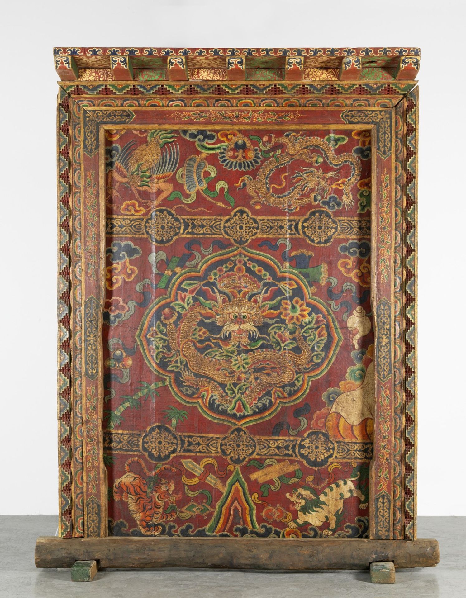 Arte Himalayana A large wooden polychrome doorgateTibet, early 20th century .