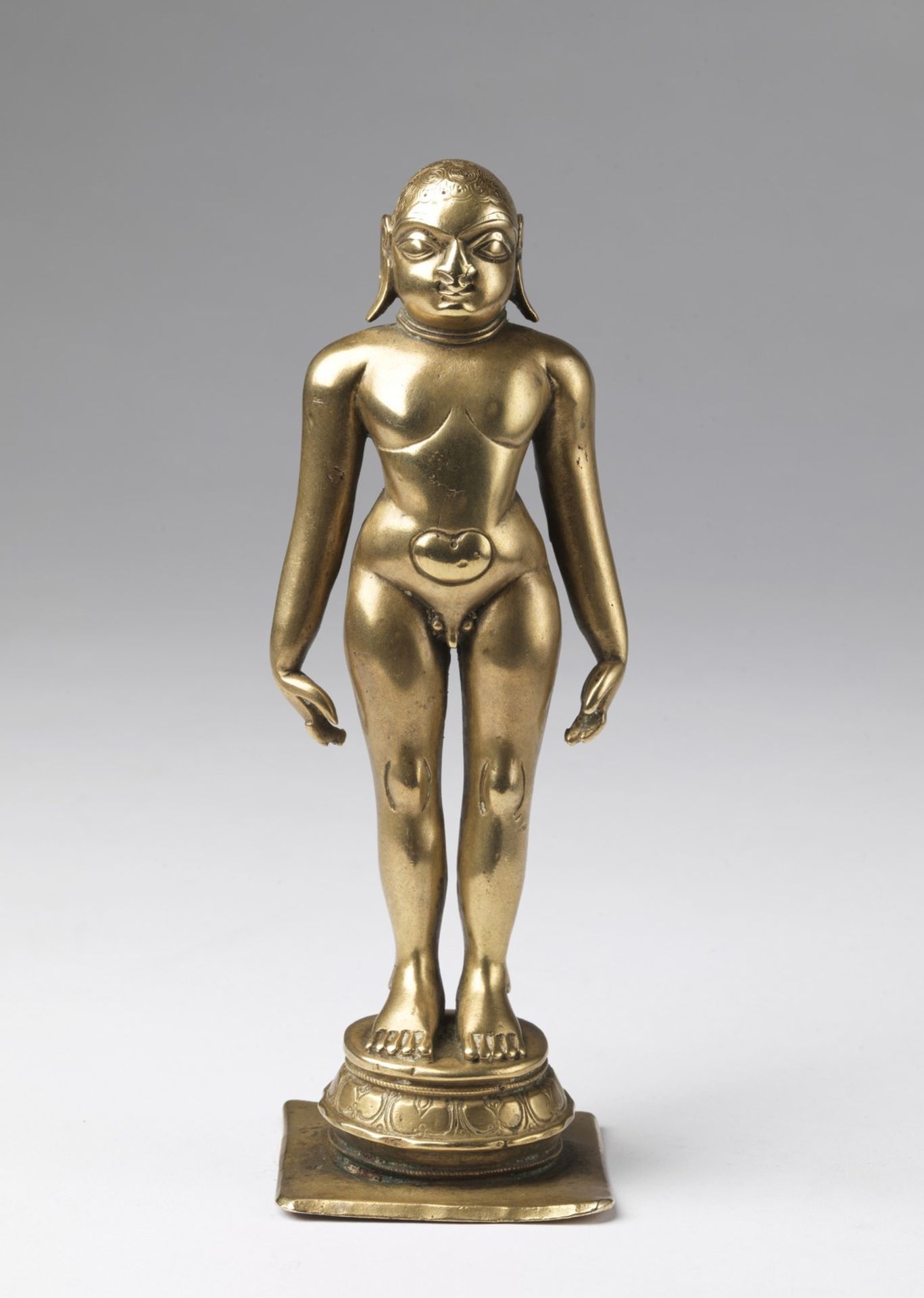 Arte Indiana A brass jaina standing figure India, Karnataka, 16th-17th century .