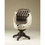 . A swivel armchair with elephant jaw England, 19th century .