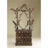 . Antlers rifle rack decorated with antlers Central Europe, early 20th century .