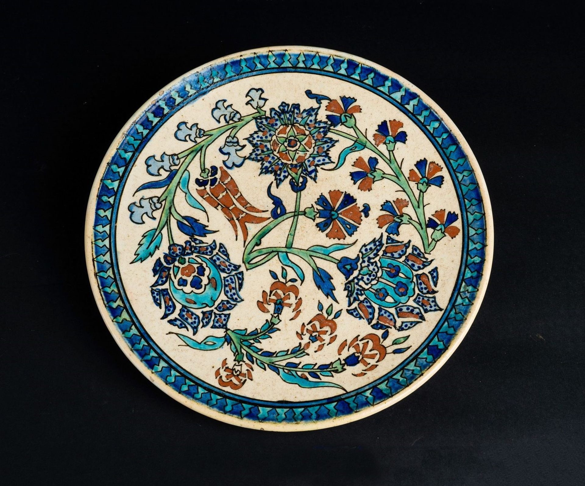 Arte Islamica A rimless pottery Iznik style dish Europe, possibly France, 19th century .