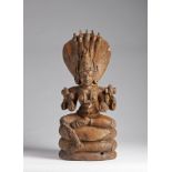 Arte Indiana A wooden carved figure of Padmavati with nagaIndia, Nayak, 18th century .