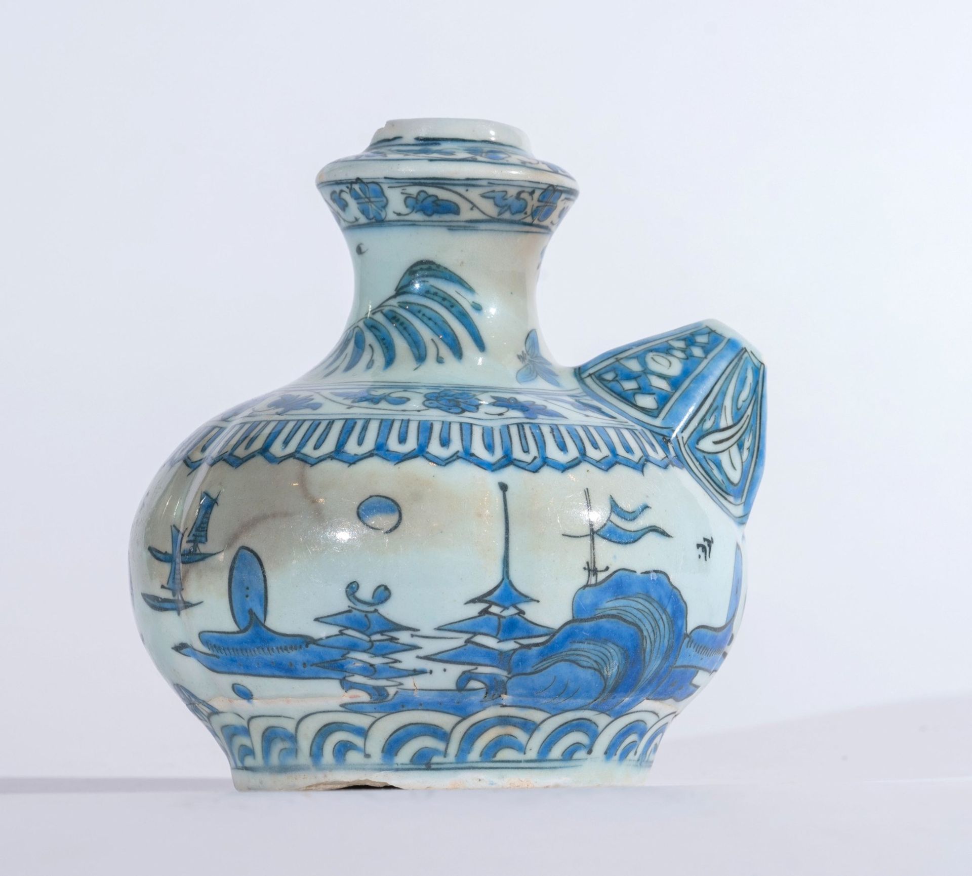 Arte Islamica A blue and white pottery kendi bearing a square mark at the base Iran, Safavid dynast