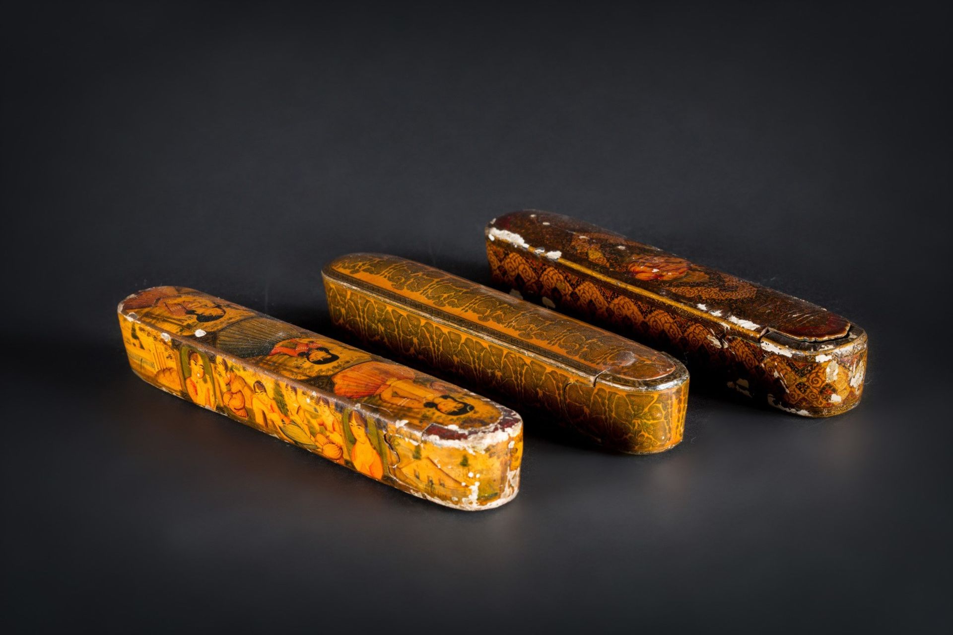 Arte Islamica Three Qajar papier machè pen cases Iran, Qajar dynasty, 19th century .