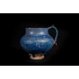 Arte Islamica A blue glazed pottery jug Iran, 13th century .