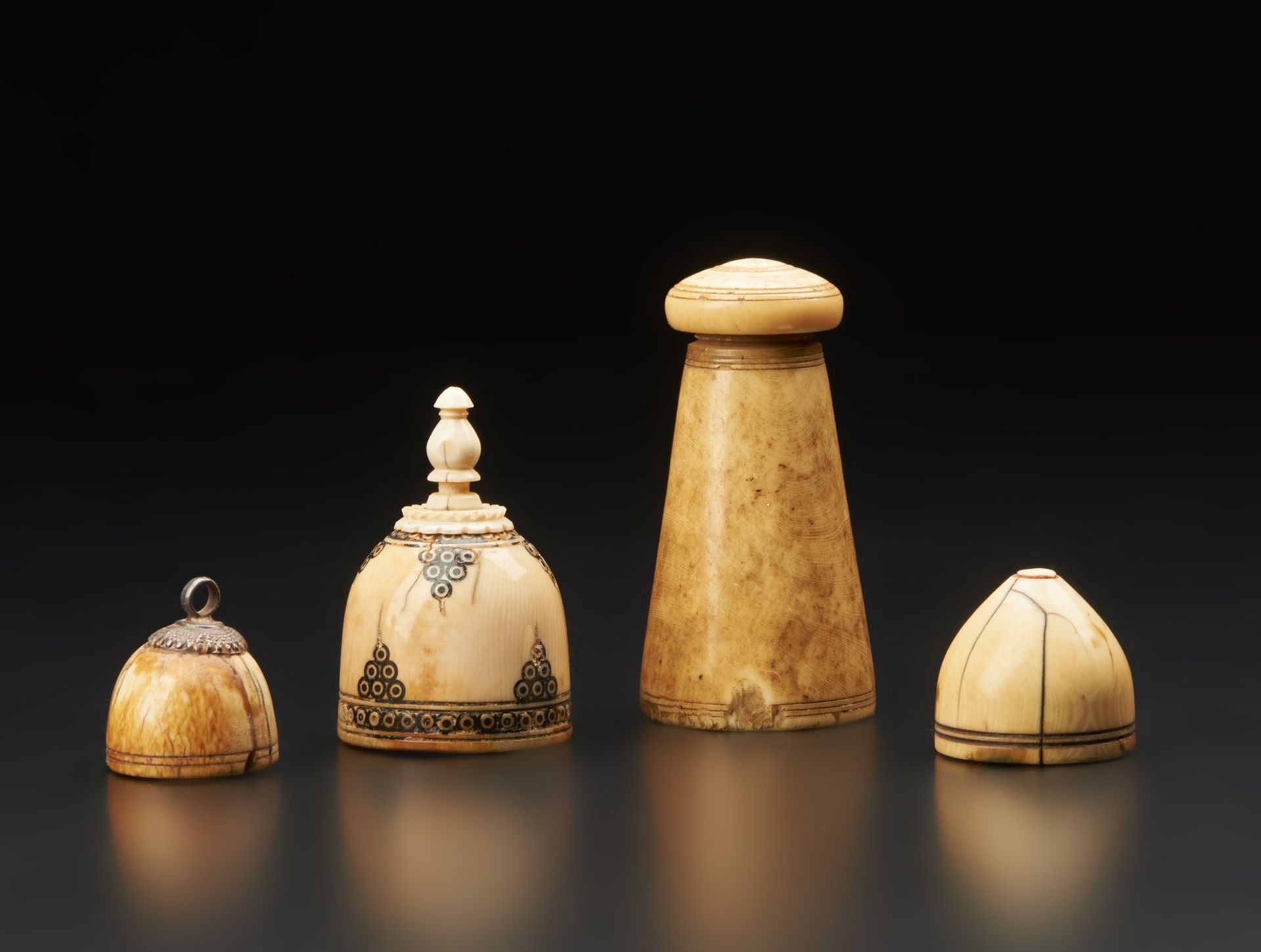 Arte Islamica A group of four ivory games pieces East Iranian region, 9th-11th century or later .