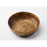 Arte Islamica A gilded copper (tombak) hammam bowl embossed with a star shaped lattice patternOttom
