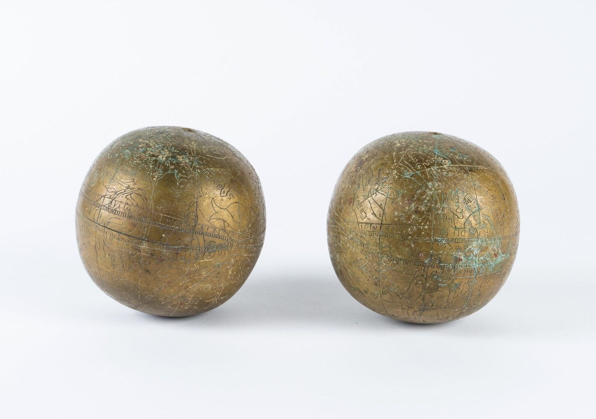 Arte Islamica Pair of brass Indian celestial globes India, 19th century .