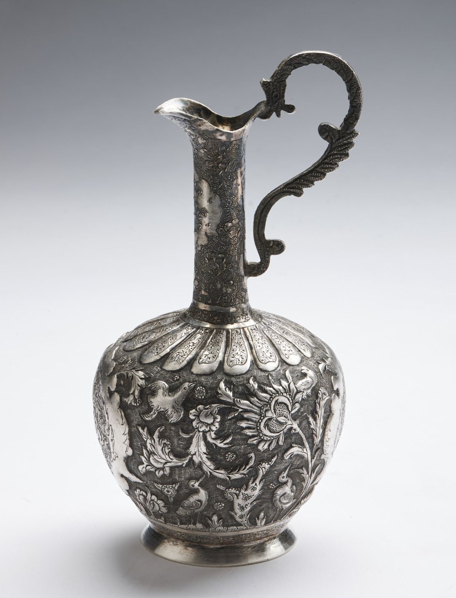 Arte Islamica A small silver jug decorated with birds and flowers Persia, 19th century .