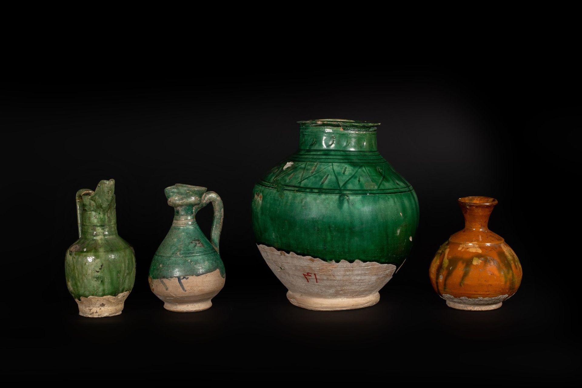 Arte Islamica A group of four pottery itemsIran, Kashan or Amol and/or Spain, 13th-19th century (?)