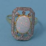 A 9ct gold, opal and diamond ring, approx. ring size N Modern