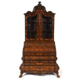 A Dutch mahogany bureau bookcase, inlaid all over with floral marquetry, having a pair of glazed