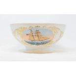 A 19th century porcelain bowl, painted a vignette of a two masted sailing ship, 28 cm diameter