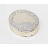 A silver oval secrets enamel nude pill box Modern