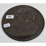 A 19th century bronze plaque, Dickens, signed Bago and dated 1870, 21 cm diameter