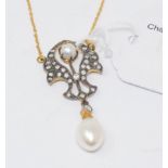 An Edwardian style diamond and pearl necklace