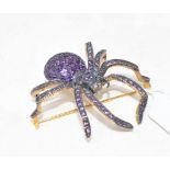 A 9ct gold and silver brooch, set amethyst and diamonds in the form of a spider Modern