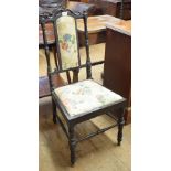 A late 19th century ebony chair, on turned front legs Report by RB Back is strengthened with two