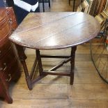 An oak corner dropleaf table, on baluster turned supports, probably 18th century Report by GH