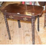 A 19th century mahogany side table, having an octagonal top and a single frieze drawer, on pierced