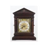 A late 19th century mantel clock, the 16 cm square brass dial signed Jameson, Dublin, with a