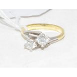 An 18ct gold and two stone diamond fancy crossover ring, diamonds approx. 2.37ct, approx. ring