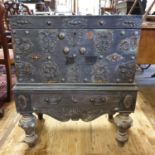 An Eastern box on stand, with steel strapwork, the base having a drawer, on turned legs, 73 cm