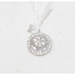 An 18ct white gold, baguette cut and brilliant cut diamond pendant, diamonds approx. 0.46ct