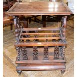 A Victorian rosewood Canterbury whatnot, on turned feet, 58 cm wide Lacks gallery, top warped,