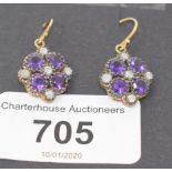 A pair of drop earrings, set amethysts and diamonds, boxed