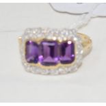 A 9ct gold and three emerald cut amethyst and diamond ring, approx. ring size O Modern