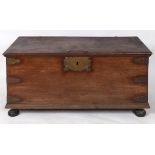 A large Zanzibar chest, with brass mounts, on bun feet, 142 cm wide Report by RB Top stained, slight