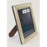 A silver mounted strut photograph frame, 23 x 18 cm Modern