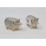 A pair of novelty silver pig salt and pepper pots Modern