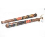 A Victorian painted Police truncheon, 40 cm, and another similar (2)