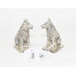 A pair of plated condements, in the form of Alsatian dogs, 7 cm high (2) Modern