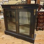 A Victorian ebonised pier cabinet, with floral marquetry inlaid decoration, 112 cm wide