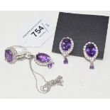 A silver and amethyst necklace, with a matching ring and earrings (3) Modern