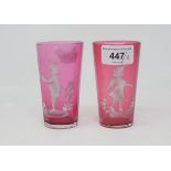 A pair of cranberry glass tumblers, with Mary Gregory style decoration, 10 cm high (2) Modern