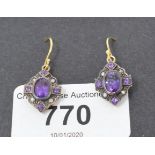A pair of 9ct gold, amethyst and diamond drop earrings Modern