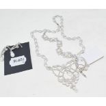 A silver and pearl set, comprising earrings, necklace, bracelet and a ring (4) Modern