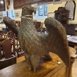 A carved wood figure of an eagle, with outstretched wings, possibly from a lecturn, lacks legs, 59