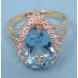 A 9ct gold, blue topaz and diamond ring Modern